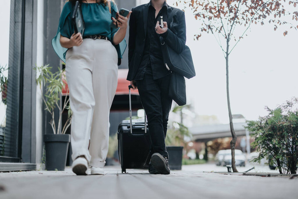 In an urban city, a young couple discusses innovative ideas for their start-up business. They analyze finances and plan for growth towards greater revenue and market expansion. - Photo, Image