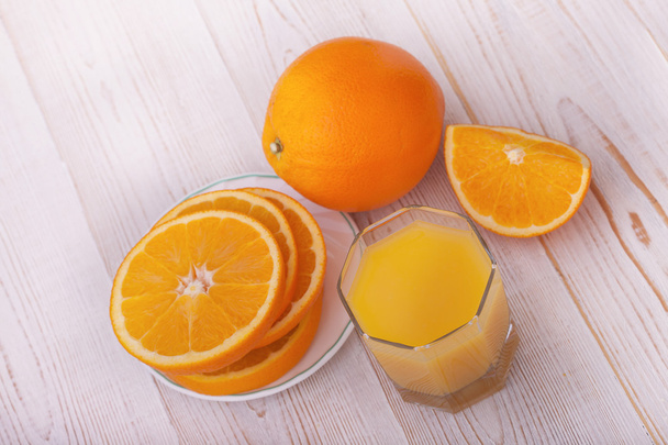 Glass of freshly pressed orange juice  - Фото, зображення