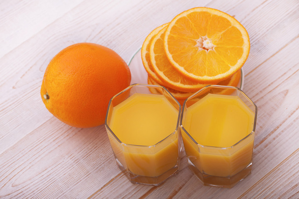 Glass of freshly pressed orange juice  - Foto, afbeelding