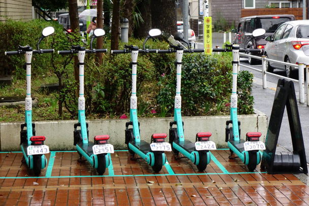 03/18/2023, Tokyo Japan, electric scooters are installed that can be used around the city - Photo, Image