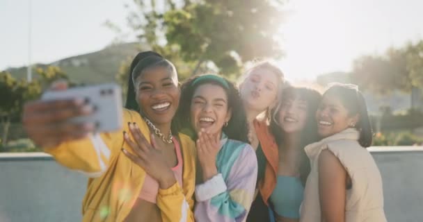 Women, group selfie and park for youth culture with funny face, blow kiss and diversity with post on web blog. Gen z girl friends, photography or profile picture with memory, emoji and social media. - Footage, Video