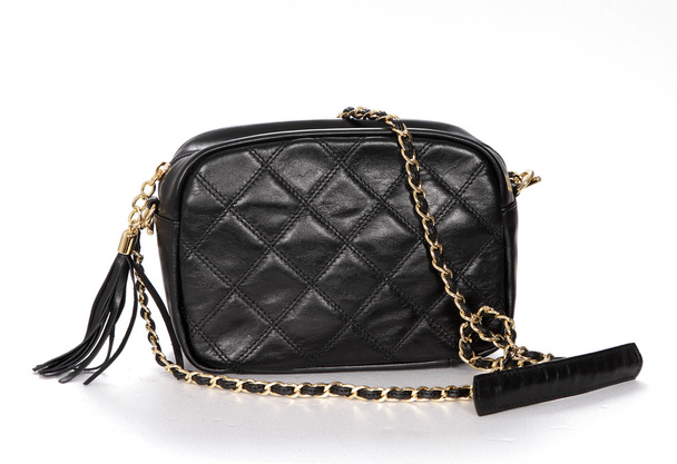 Black genuine leather bag with golden chain - Photo, Image