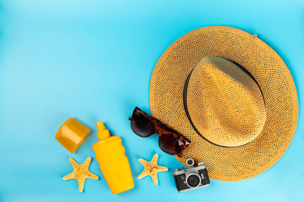 Sunscreen on a blue background. SPF cream. Sun protection. UV protection. Summer. The concept of rest and vacation. Summer mood. Design. MOCKUP. Vacation.Beauty - Photo, Image
