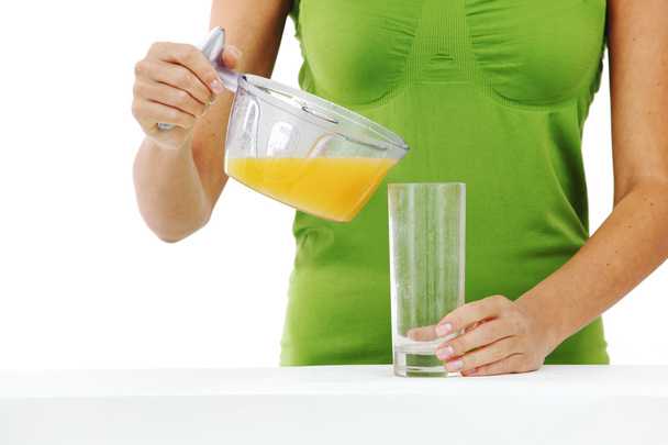 Woman squeezes juice - Fotoğraf, Görsel