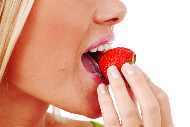 Woman eat strawberry - Fotó, kép