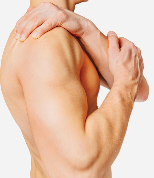 Man with pain compresses his shoulder - Foto, Imagem