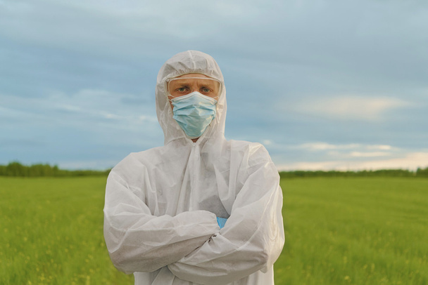 Agronomist scientist in protective uniform - Φωτογραφία, εικόνα