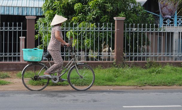 woman rides bicycle - Photo, Image