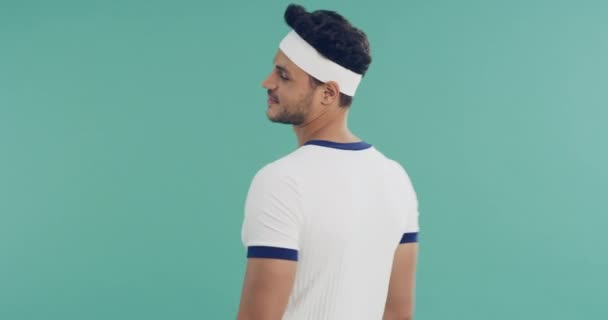 Man, retro clothes and fitness in studio with face, smile or headband for training by green background. Person, model and athlete in 80s fashion for workout, wellness or health with face in portrait. - Footage, Video