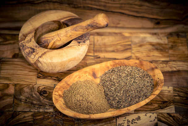 caraway seeds Carum carvi on olive wood - Photo, Image