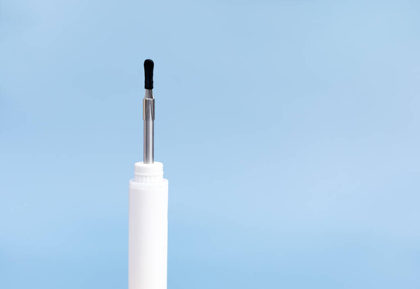 Mockup Closeup Ear Scope For Wax Removal Tool. Digital Otoscope, Earwax Cleaner With Gyroscope, Camera, Light. Cleaning Ears Device Connected to Smartphone. Ear Cleaning Technology. Copy Space. - Photo, Image