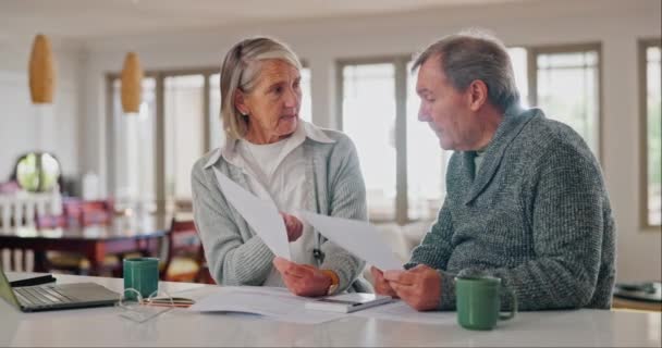 Senior couple, documents and stress for home debt, financial fail or budget risk with fight, argue and frustrated. Angry elderly woman and man paperwork, loan and inflation or bankruptcy on laptop. - Footage, Video