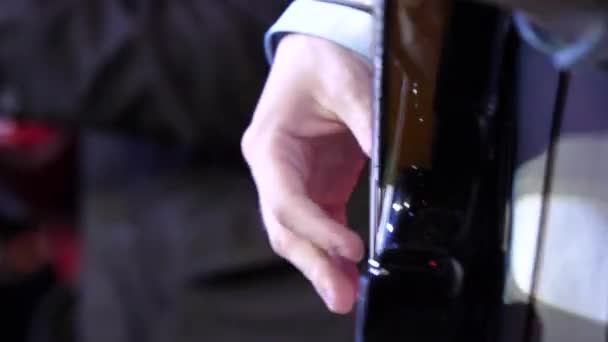 A man is playing guitar on stage. Young man playing on electric guitar close-up. Artist Guitarist hand play electricity guitar on concert 4K - Footage, Video