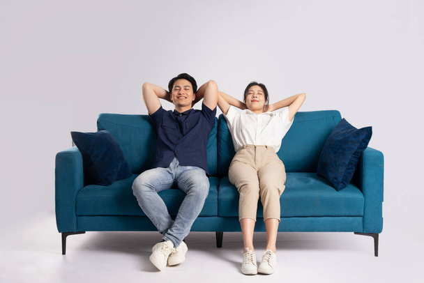 Image of an Asian couple posing on a white background - Photo, Image
