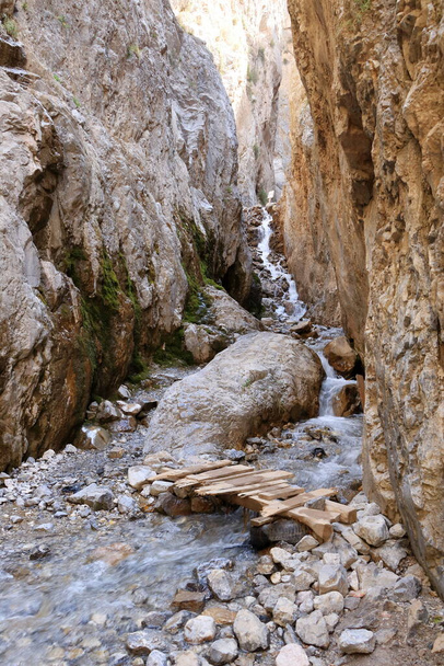 river at the foot of the waterfall near Arslanbob, Kyrgyzstan, Central Asia - Photo, Image