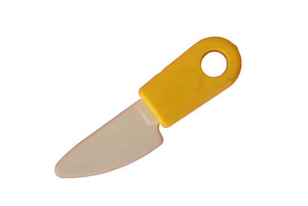 Toy knife isolated on a white background. - Photo, Image