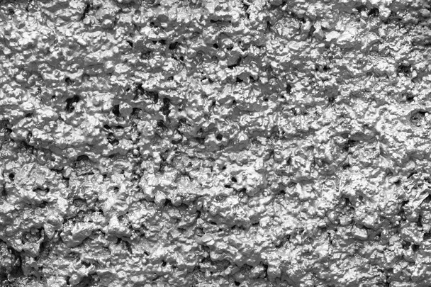 бурхливі поверхні стін сірого кольору
 - Фото, зображення