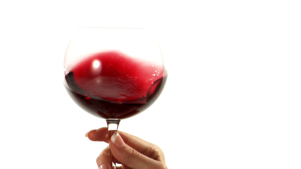 Περιστροφικές κινήσεις κόκκινο κρασί σε ποτήρι - Πλάνα, βίντεο