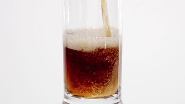 Pouring cola into a glass - Materiał filmowy, wideo