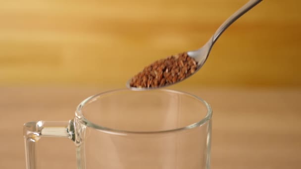 To prepare a therapeutic decoction, flax seeds are poured into a glass. Slow motion. - Footage, Video