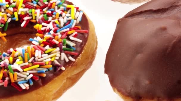 Donuts sobre fondo blanco - Imágenes, Vídeo