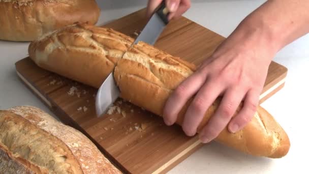 Chef slicing baguette - Footage, Video