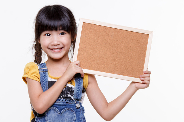 Asian girl with empty board - Foto, Imagen