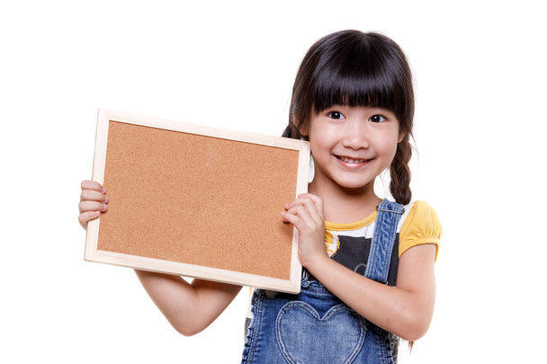 Küçük Asyalı çocuk ile boş tahta - Fotoğraf, Görsel