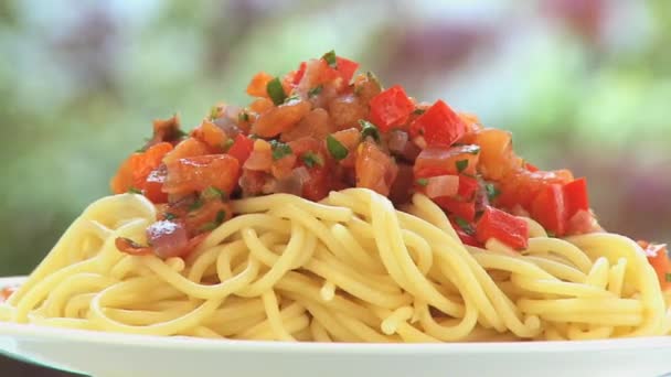 Pasta con salsa de tomate
 - Metraje, vídeo