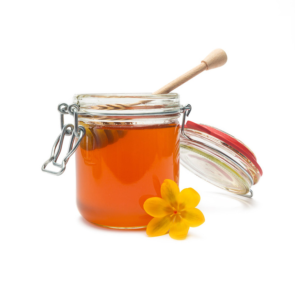 Скляна банка біо меду з медовим дрібкою
 - Фото, зображення