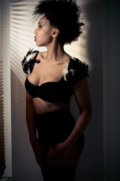 Beautiful fashion model wearing black lingerie - Фото, изображение