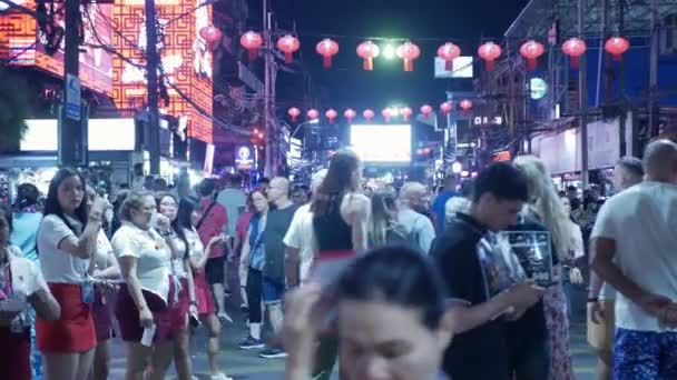 January21,2023.Phuket,Thailand.nightlife Patong walking street Bangla Road, famous shopping and entertainment destination at patong beach during night time with crowded people - Footage, Video