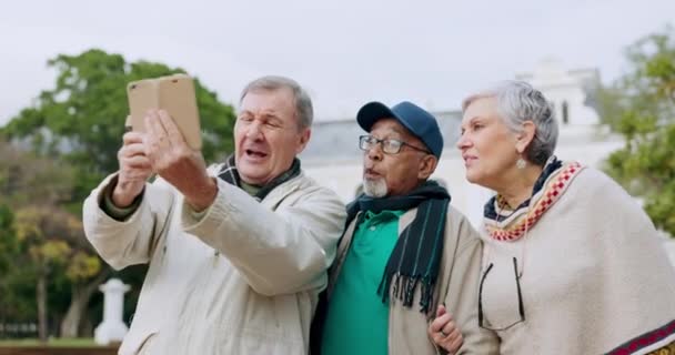 Happy, selfie and senior friends in parks for social media, support and freedom. Retirement, smile and post with mature people and picture in nature for community, relax and happiness together. - Footage, Video