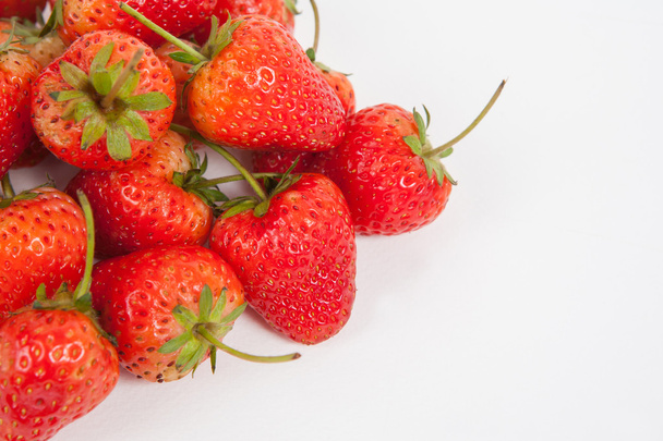 strawberry on white paper background - Foto, afbeelding