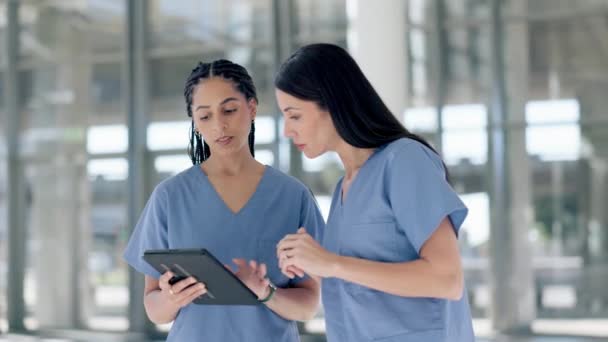 Nurses, women and advice on tablet in hospital for healthcare, telehealth analysis and online test results. Doctors, medical team and discussion with digital tech for planning data, research and help. - Footage, Video