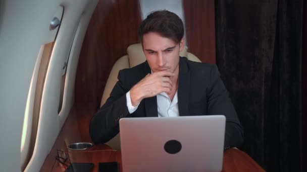 Man with successful career traveling first class route to business meeting successful career personified in elegant suit and comfort. Joyful life and boundless freedom fruits of successful career - Footage, Video