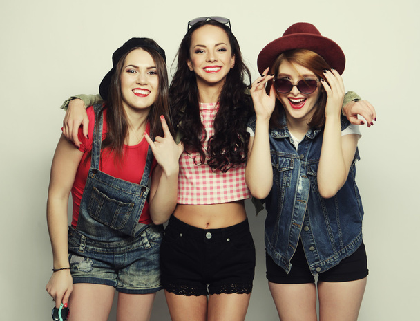 Three stylish sexy hipster girls best friends. - Foto, Bild