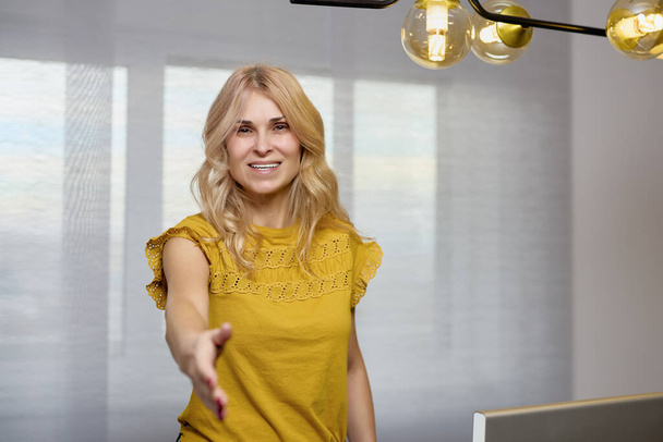 Middle-aged business woman in the office in different poses. - Photo, Image