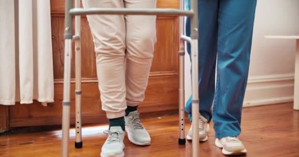 Senior, hands or nurse with walker for support, help or movement in retirement home. Elderly, woman with disability or caregiver with happiness for mobility, rehabilitation or recovery in living room. - Footage, Video