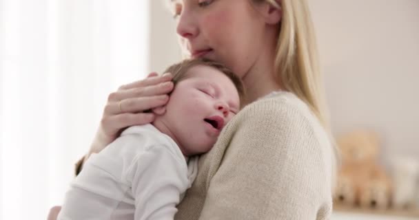 Love, mother and baby in nursery for sleeping, bonding and touch or cuddle with support or care. Woman, mom or holding newborn in bedroom with bond and relax for child development and nurture in home. - Footage, Video