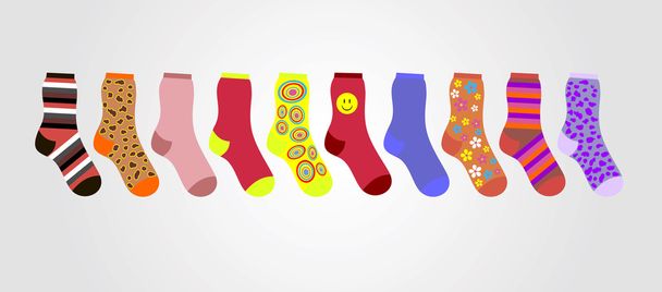 vector kleurrijke sokken op een grijze achtergrond in de lijn - Vector, afbeelding