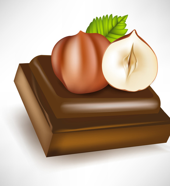 шоколадный кусочек с фундуком
 - Вектор,изображение