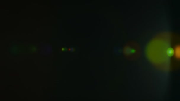 UHD Real Lens Flare Isolated on Black Background - Πλάνα, βίντεο