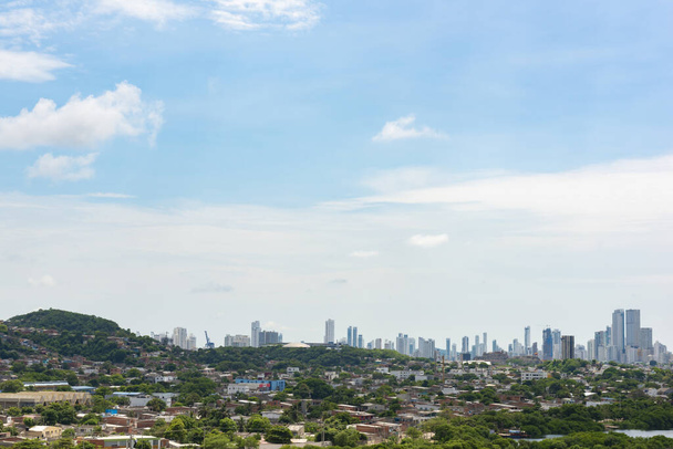 Картахена, Боливар, Колумбия. Октябрь, 2019: Pie del Cerro neighborhood and Bocagrande buildings on the horizon. - Фото, изображение