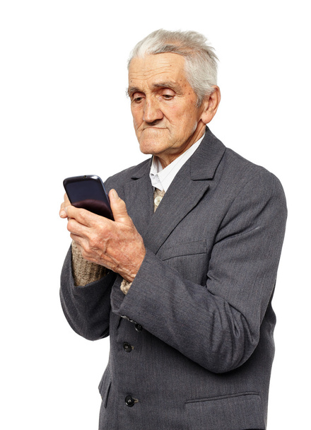 Hombre mayor sosteniendo un teléfono inteligente
 - Foto, Imagen