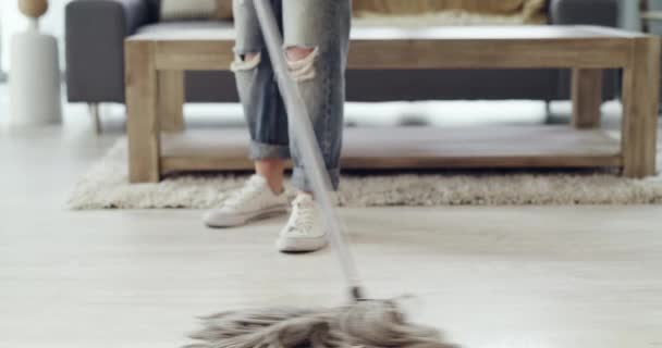 Person, legs and mop or cleaning floor for hygiene disinfection, dust maintenance or dirt task. Housekeeping, feet and equipment for maid service in house for wood ground, bacteria or germ removal. - Footage, Video