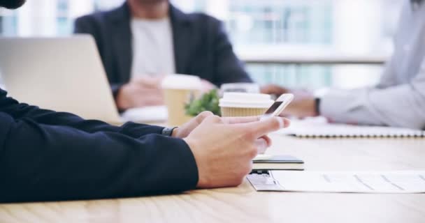 Businessman, phone and hands in meeting for networking, communication or social media at office. Closeup of man or employee typing on mobile smartphone for online search or research at workplace. - Footage, Video