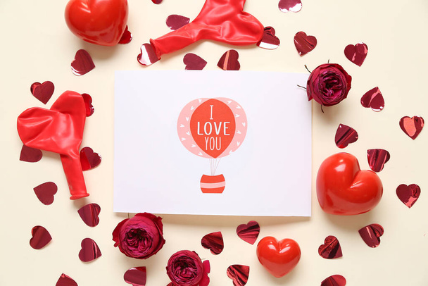 Card with text I LOVE YOU, red roses and hearts on light background. Valentines Day celebration - Fotografie, Obrázek