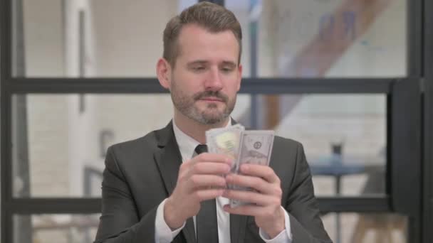 Portrait of Middle Aged Businessman Counting Money - Footage, Video