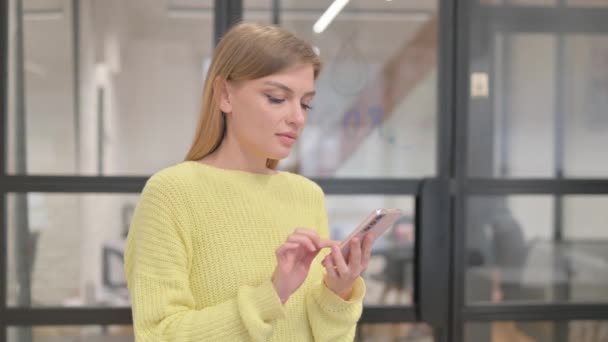 Portrait of Blonde Young Woman Celebrating Success on Phone - Footage, Video